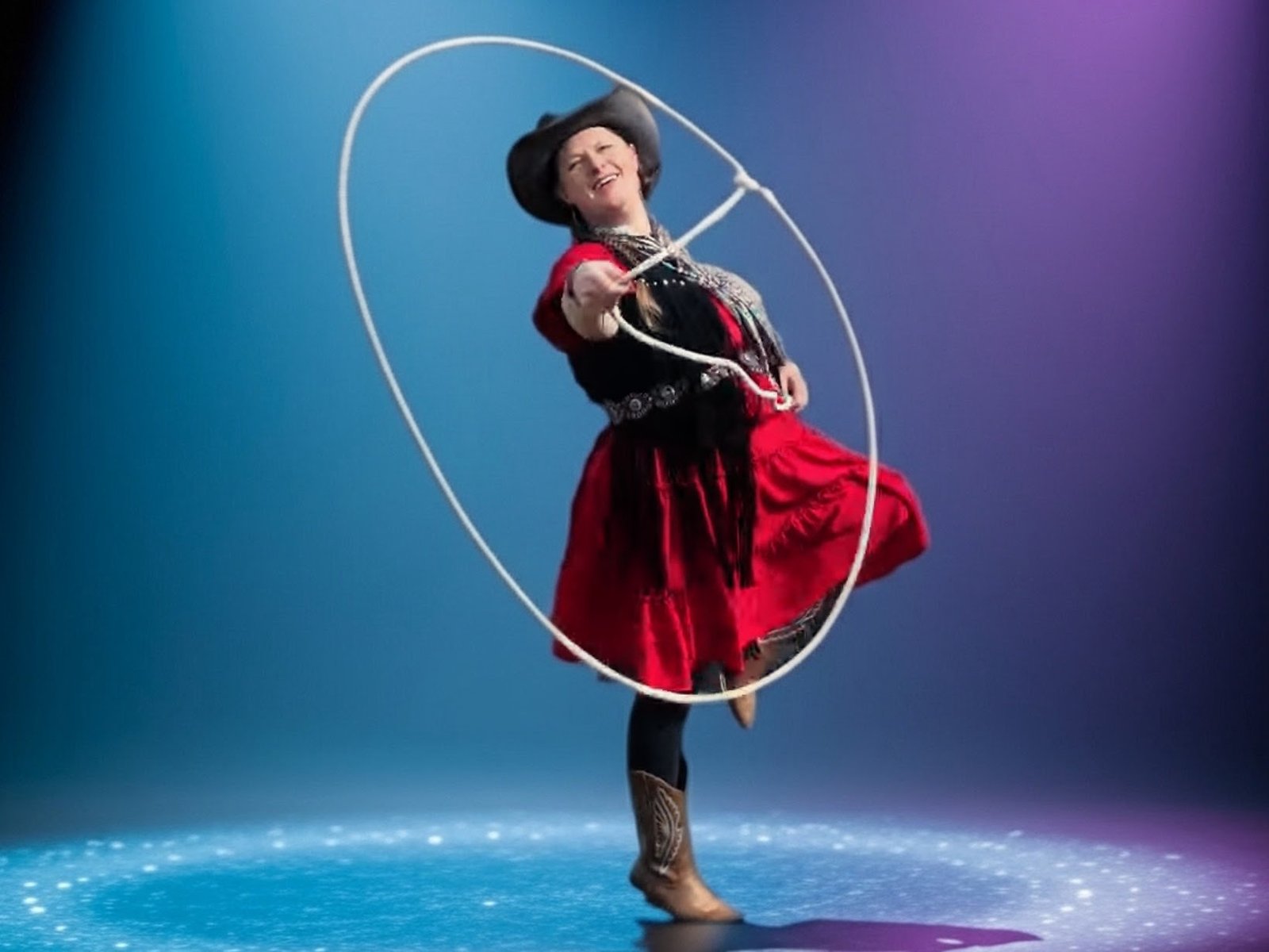 Kristen J. Lloyd, Northern Utah speaker and entertainer, roping on stage